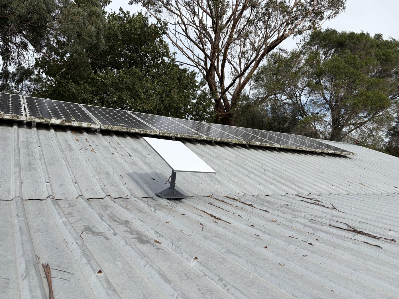 Starlink satellite dish installed on a Colorbond roof