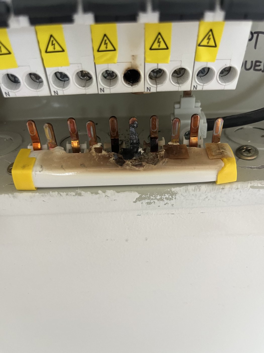 Old corroded ceramic fuse assembly before switchboard upgrade