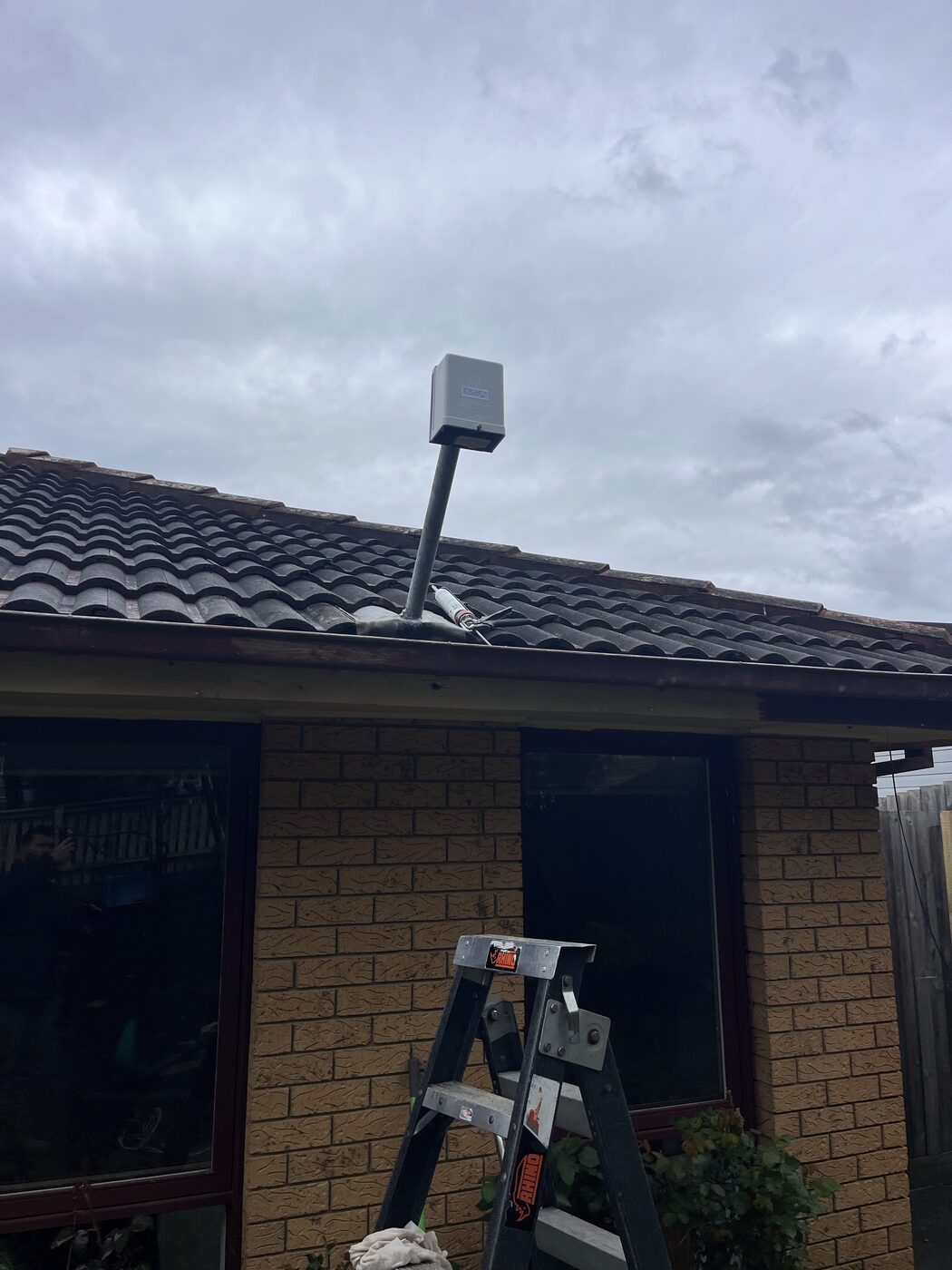 New mains connection point fuse box installed on a roof mast